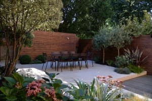 Garden Design Balham SW12 - Family garden, planting design Balham, seating area, hardwood decking, venetian trellis fencing, olive trees, designed furnitures, lighting ambiances
